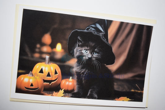 Black kitten in a witch's hat. Handcrafted All Occasion Greeting Card, blank inside.