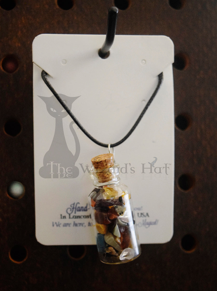 Mixed Gemstones, glass bottle with cork necklace.