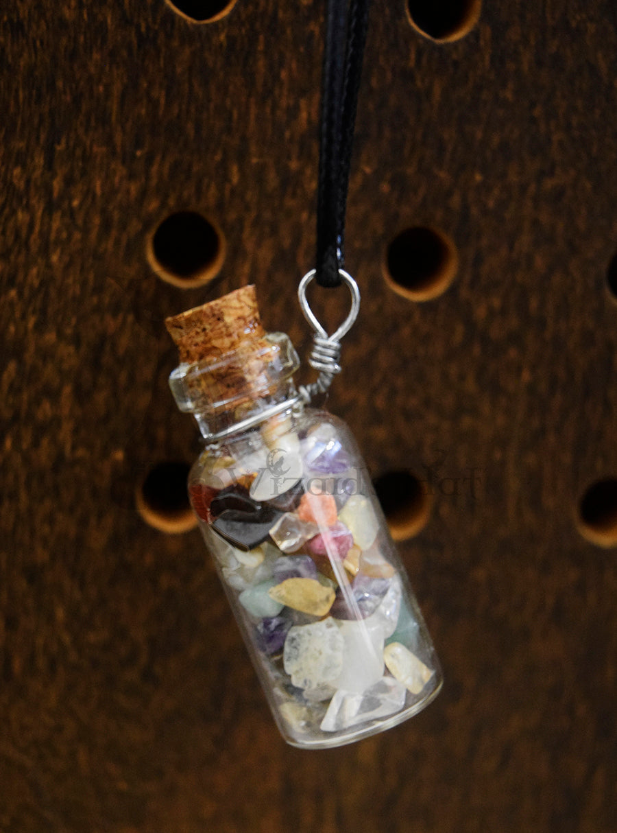 Mixed Gemstones, glass bottle with cork necklace.