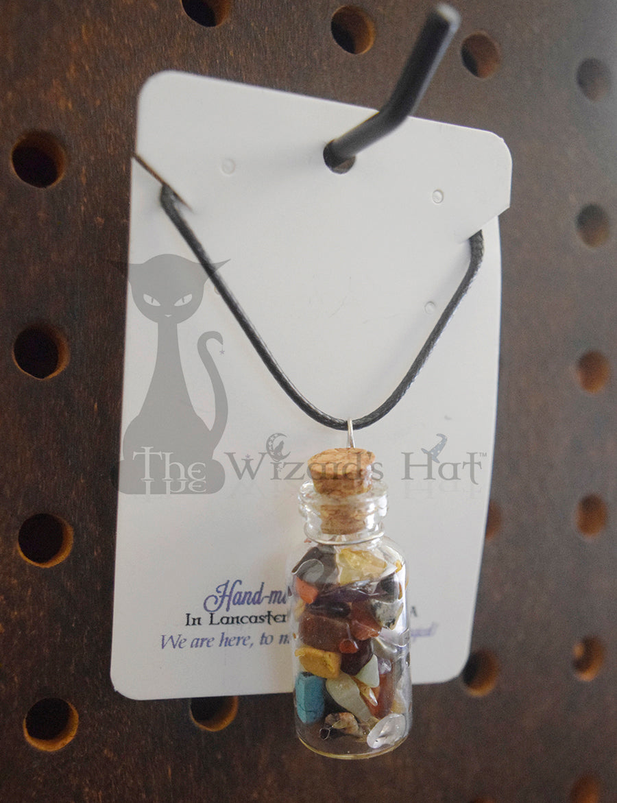 Mixed Gemstones, glass bottle with cork necklace.