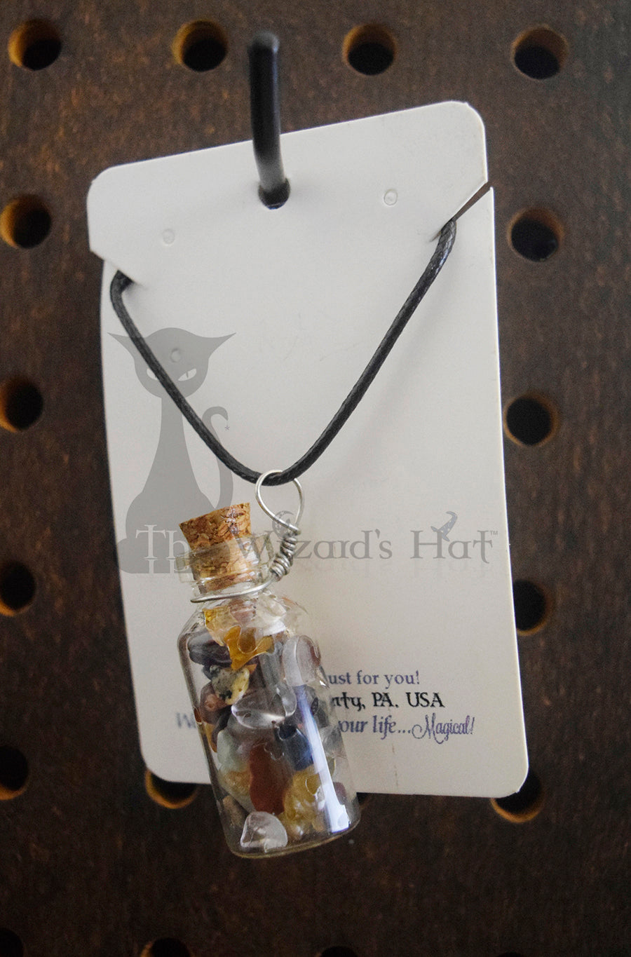 Mixed Gemstones, glass bottle with cork necklace.