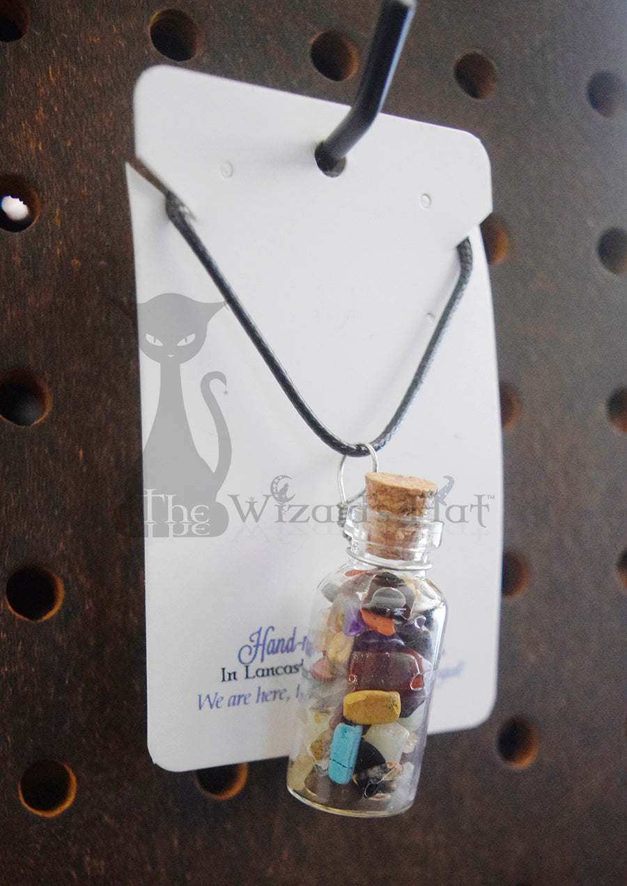 Mixed Gemstones, glass bottle with cork necklace.