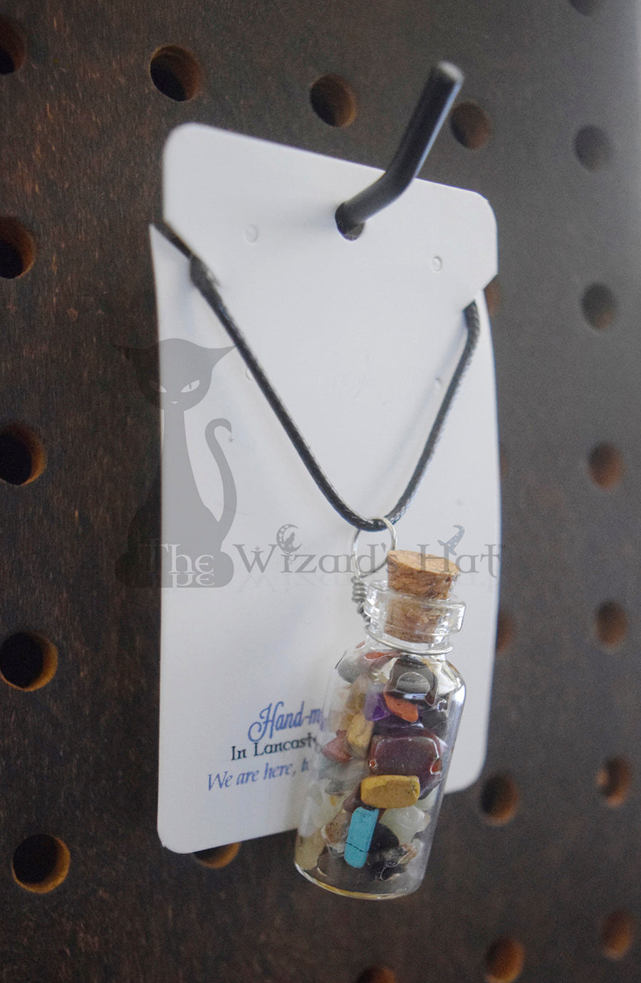 Mixed Gemstones, glass bottle with cork necklace.