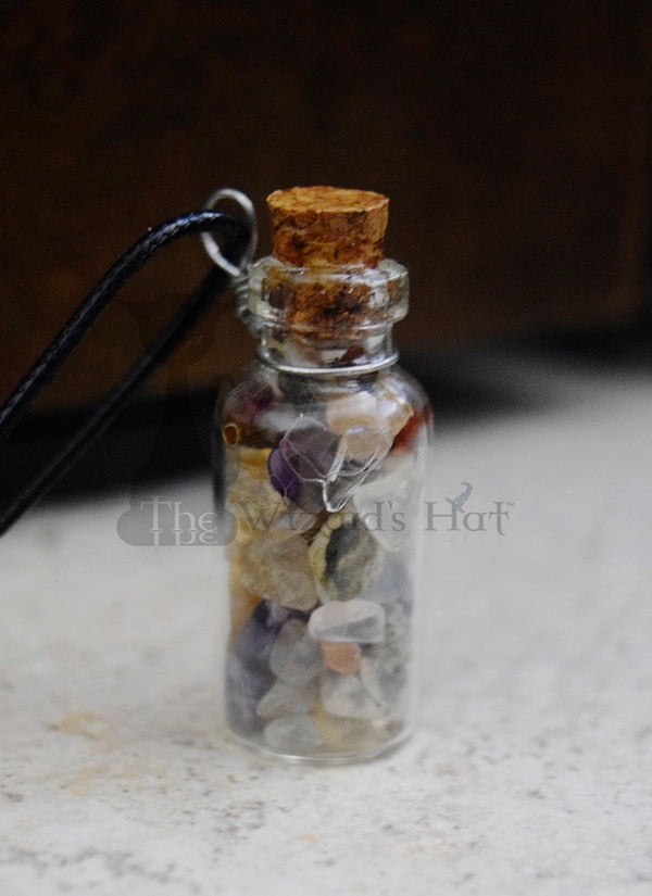 Mixed Gemstones, glass bottle with cork necklace.