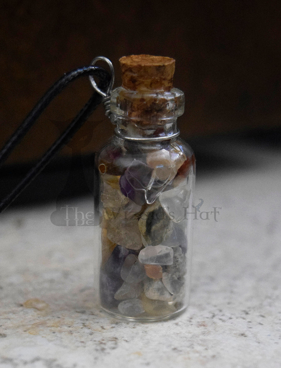 Mixed Gemstones, glass bottle with cork necklace.