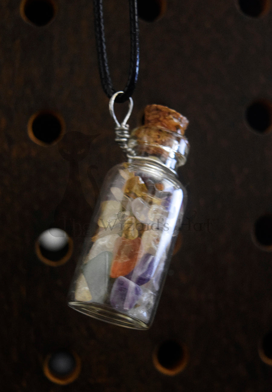 Mixed Gemstones, glass bottle with cork necklace.