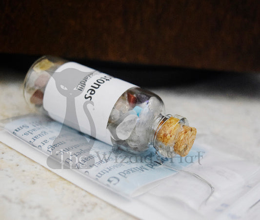 Mixed Gemstones, glass bottle with cork.